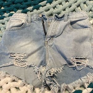 SHEIN ripped jeans shorts.